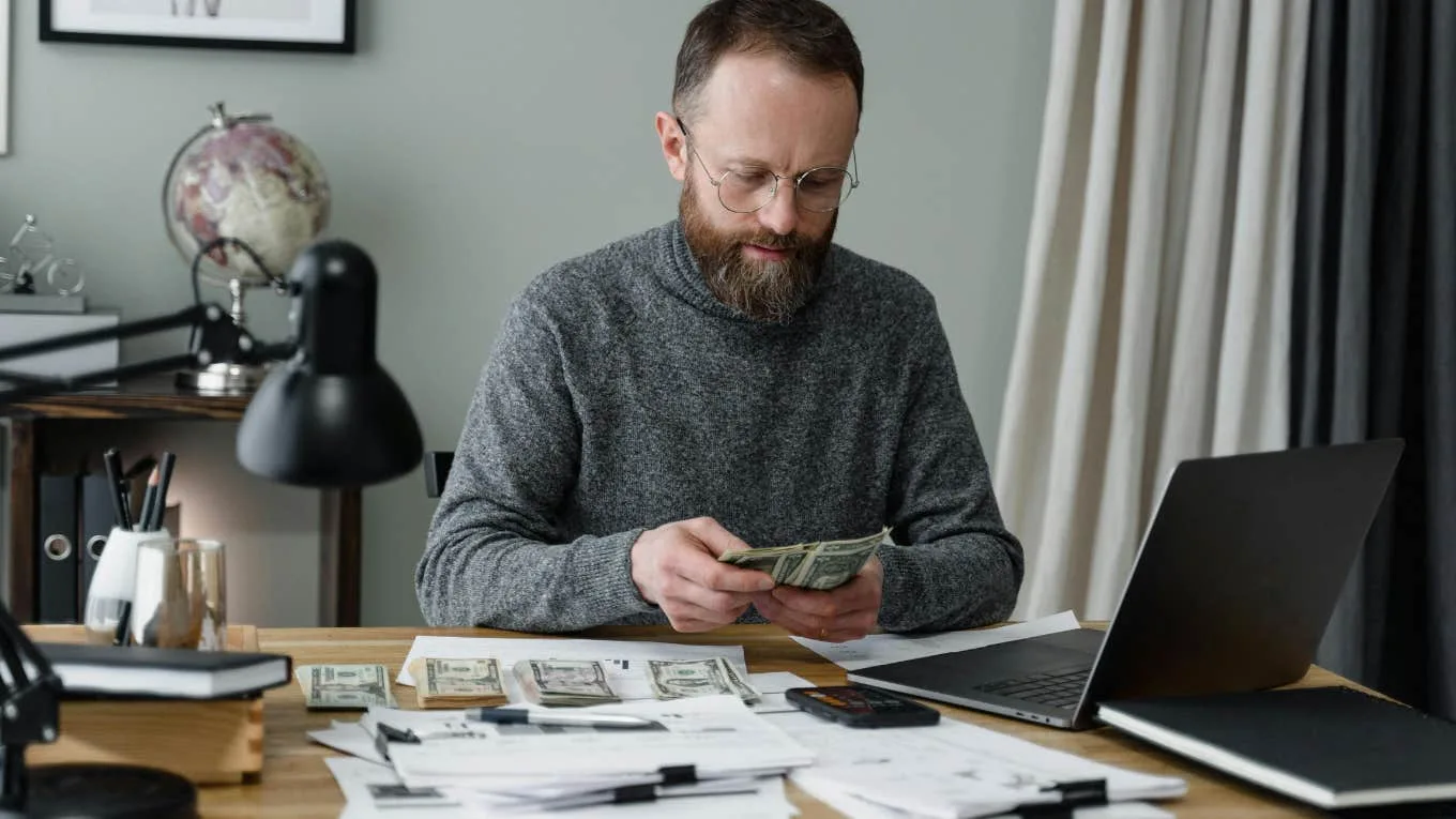 How To Save $1,000 A Year When You're Living Paycheck To Paycheck: A Month-By-Month Guide